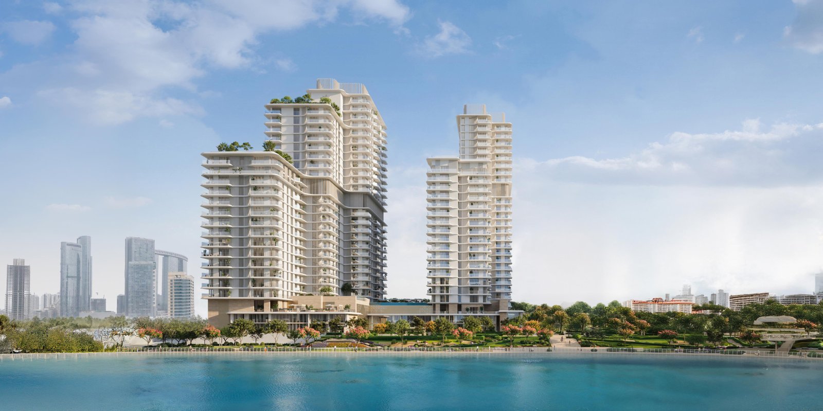 Waterfront exterior of Muheira Tower on Al Reem Island, Abu Dhabi, framed by the canal at golden hour.